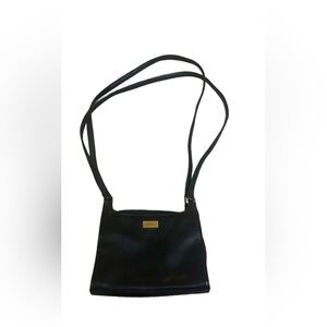 Chic Black Crossbody Bag with Gold Accents